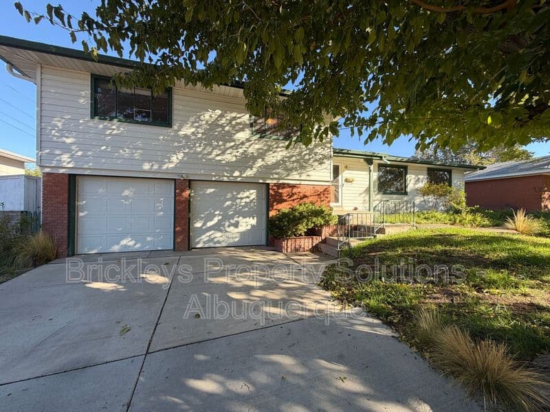 4-bedroom 3-bath home at 7121 Edwina Ave NE for $2,450/mo managed by Brickleys Property Solutions Albuquerque